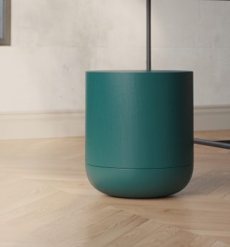 Minimalistyczny stołek Hogai Pianist Green Bottle w głębokim i szlachetnym odcieniu butelkowej zieleni.