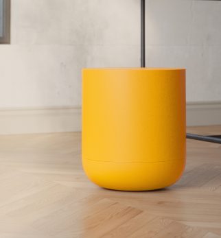 Minimalistyczny stołek Hogai Pianist Orange Joy w nasyconym i energetycznym odcieniu soczystego pomarańczu.