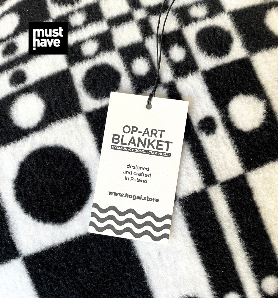 Koc op-art optic pool projektu maurycego gomulickiego dla hogai – nagrodzony must have na Łódź design festival.